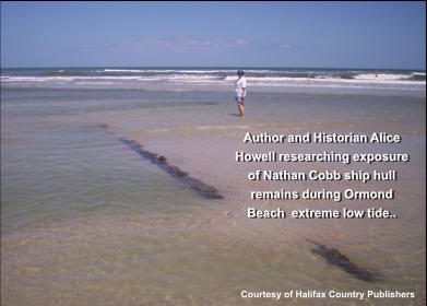 Author and Historian Alice Howell researching exposure of Nathan Cobb ship hull remains during Ormond Beach  extreme low tide.. Courtesy of Halifax Country Publishers